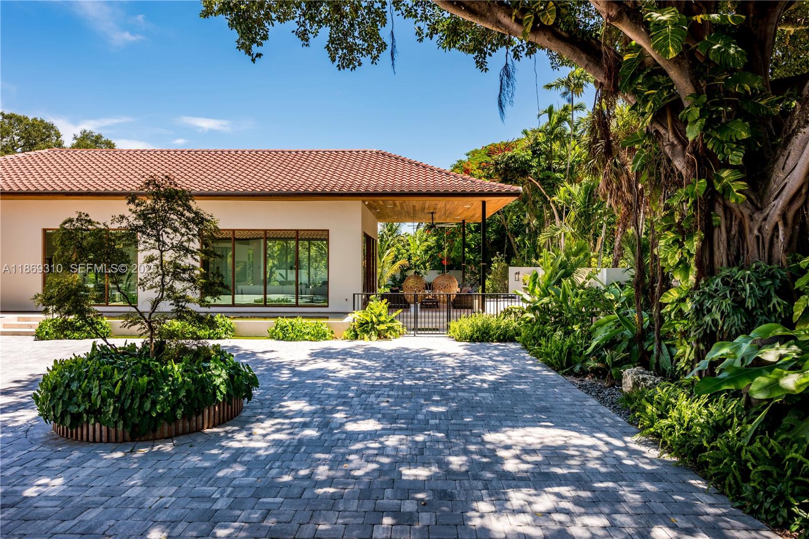 864 Northeast 84th Street Miami, FL 33138 - Photo 52 of 53 a view of a house with backyard and garden