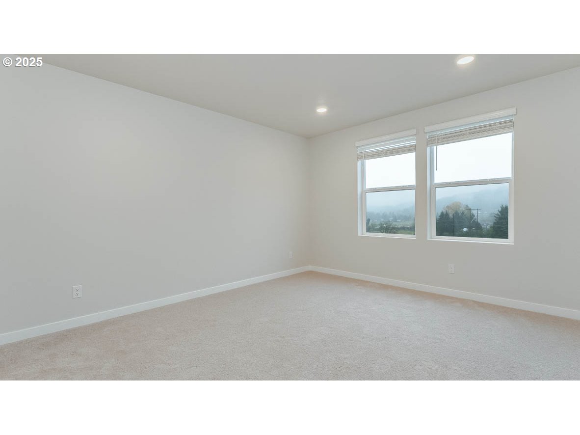 9355 Southeast Crystal Rose Street Happy Valley, OR 97086 - Photo 21 of 27 a open hall with a window