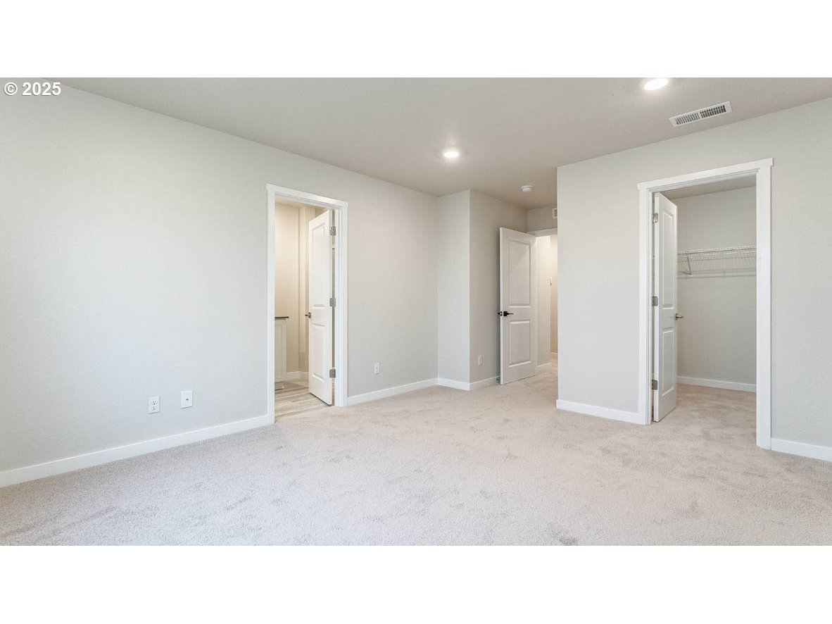 9355 Southeast Crystal Rose Street Happy Valley, OR 97086 - Photo 22 of 27 a open hall with a bench
