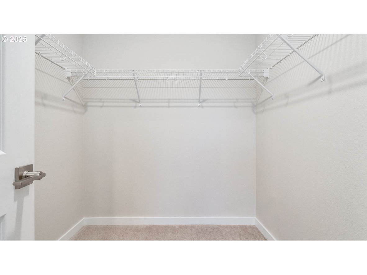 9355 Southeast Crystal Rose Street Happy Valley, OR 97086 - Photo 24 of 27 a bathroom with a shower