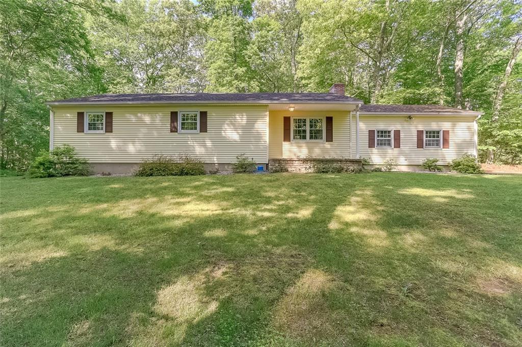 9 Hunters Path Clinton, CT 06413 - Photo 1 of 1 a view of a house with a backyard