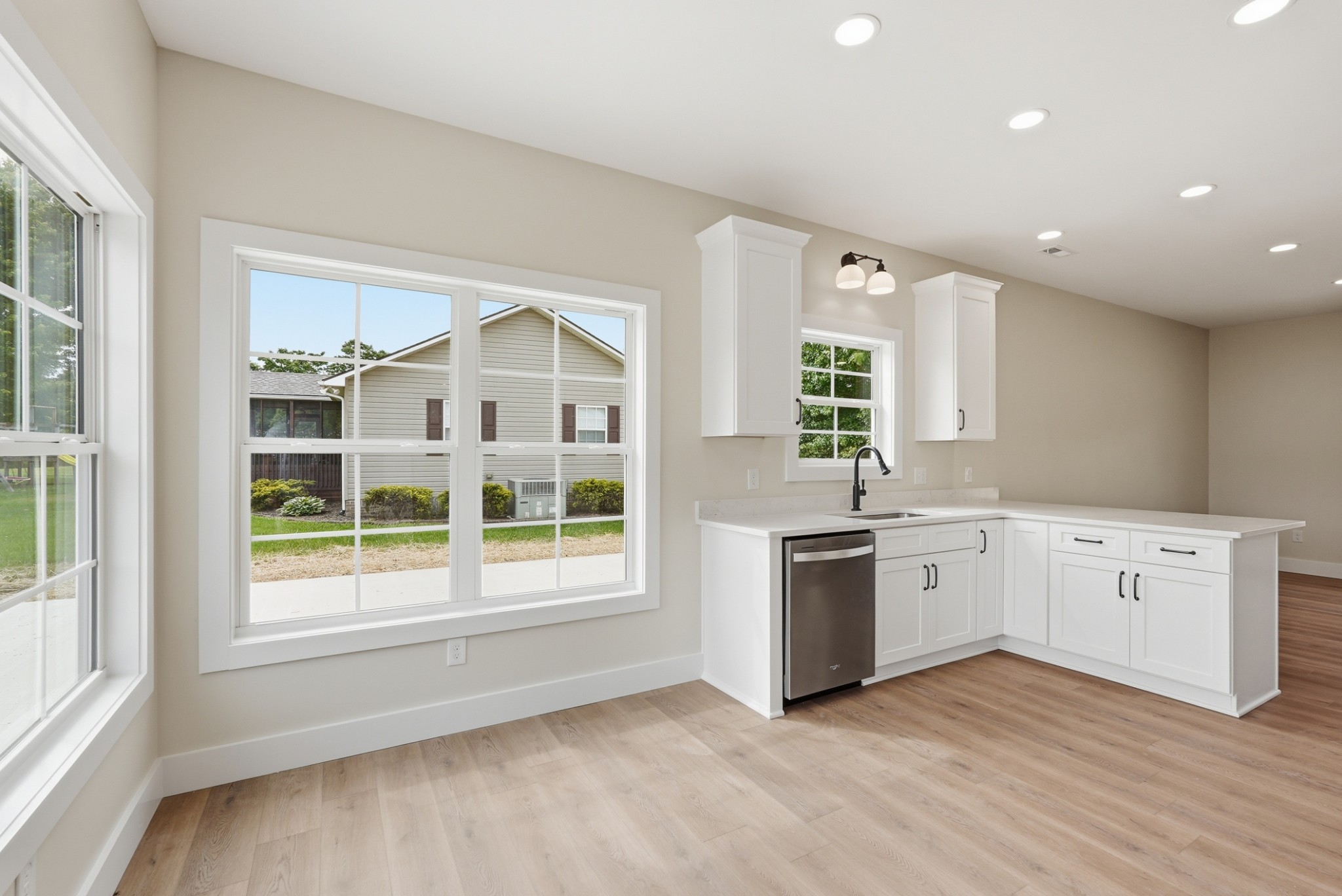 167 Fremont Road Doyle, TN 38559 - Photo 12 of 19 a large kitchen with a large window and stainless steel appliances