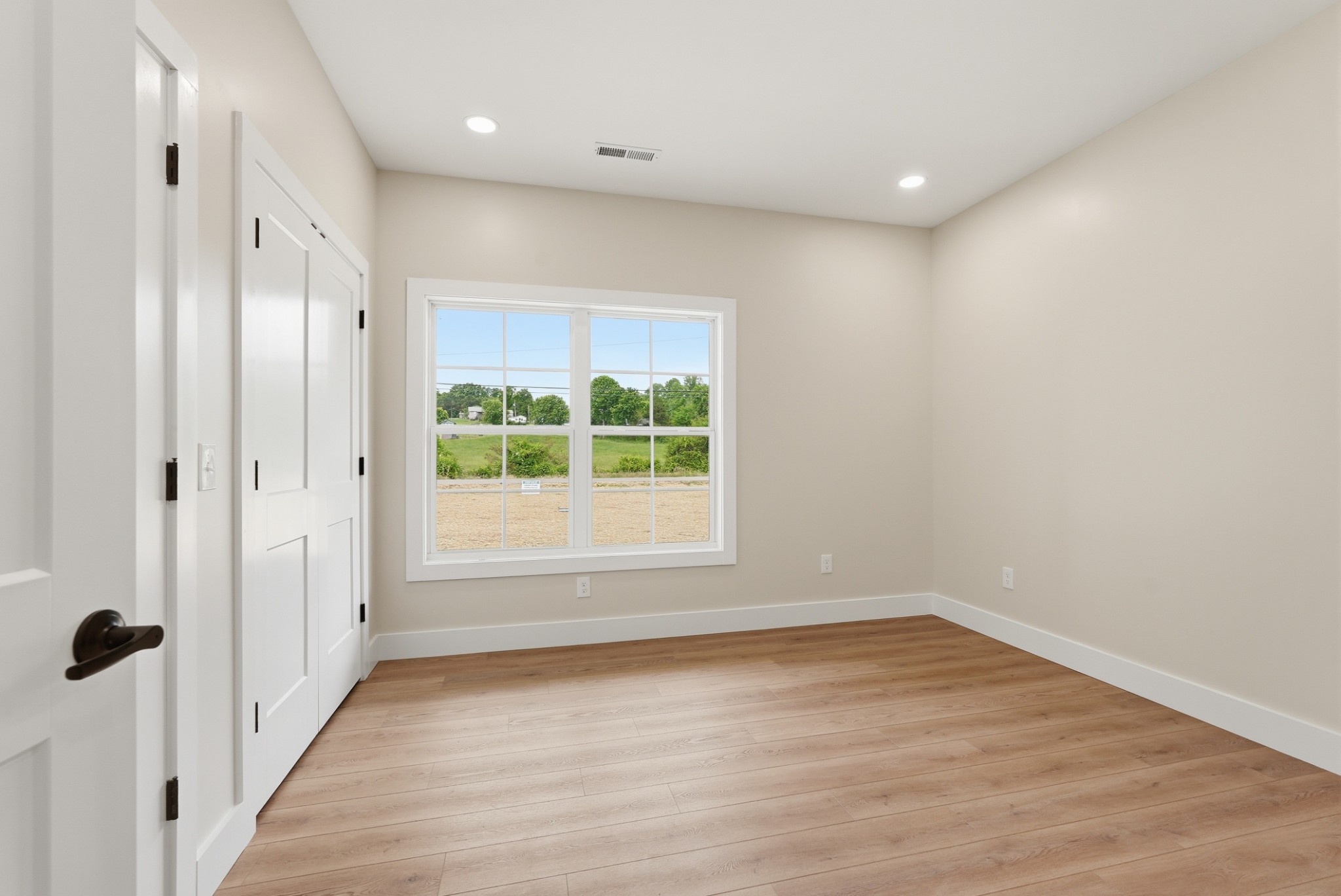 167 Fremont Road Doyle, TN 38559 - Photo 14 of 19 a view of a hallway with wooden floor and a large window