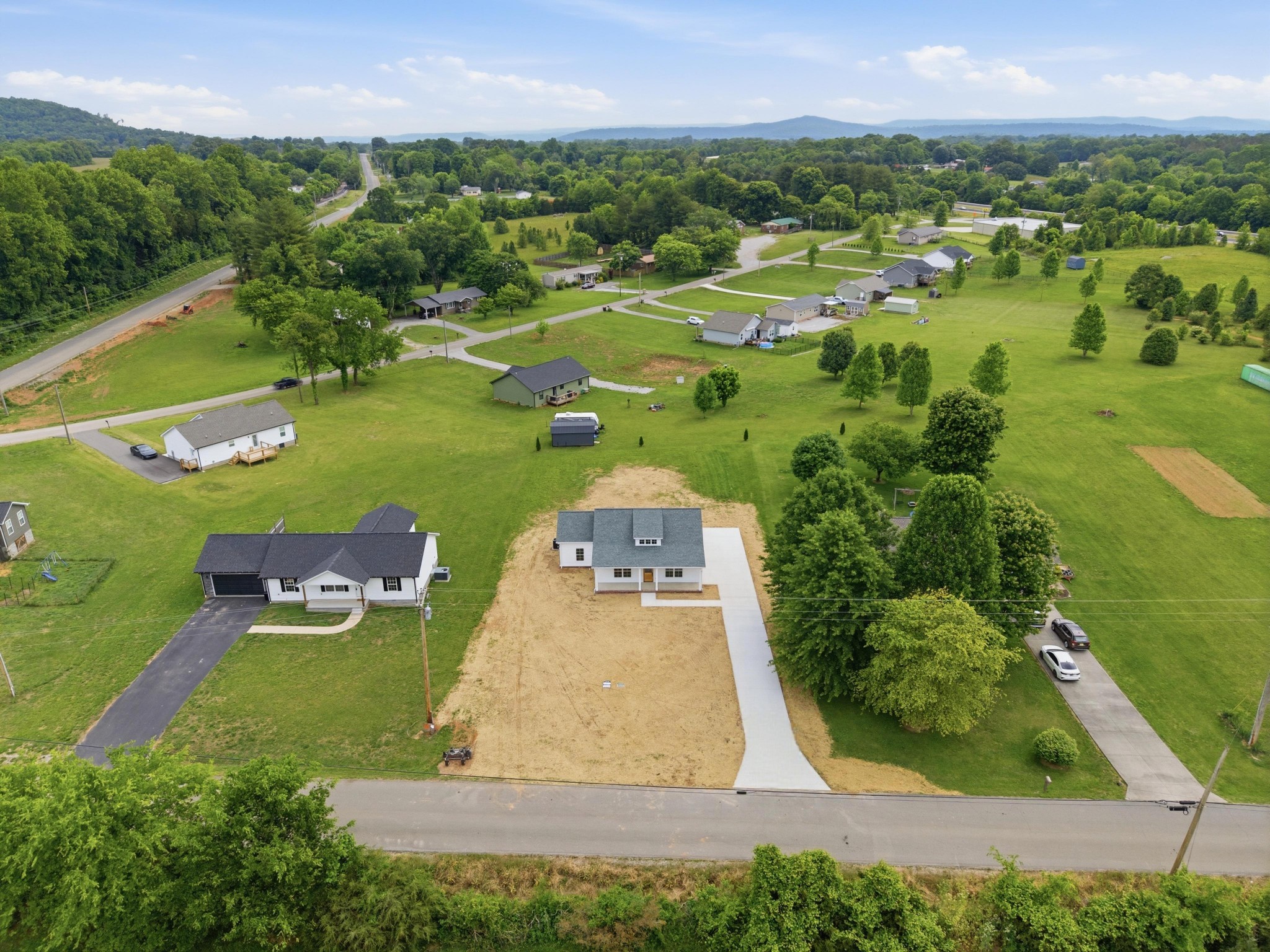 167 Fremont Road Doyle, TN 38559 - Photo 19 of 19 an aerial view of a house with a yard and lake view