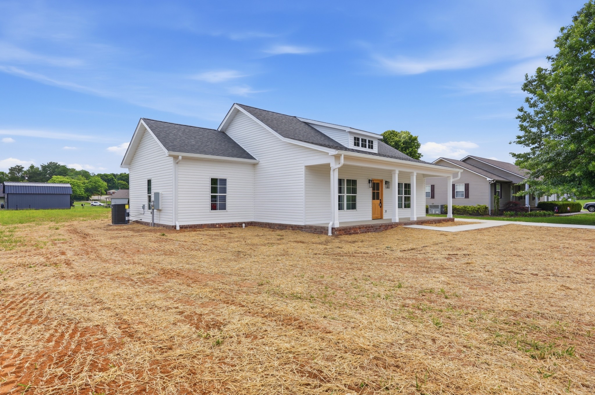 167 Fremont Road Doyle, TN 38559 - Photo 2 of 19 a view of a house with backyard and garden