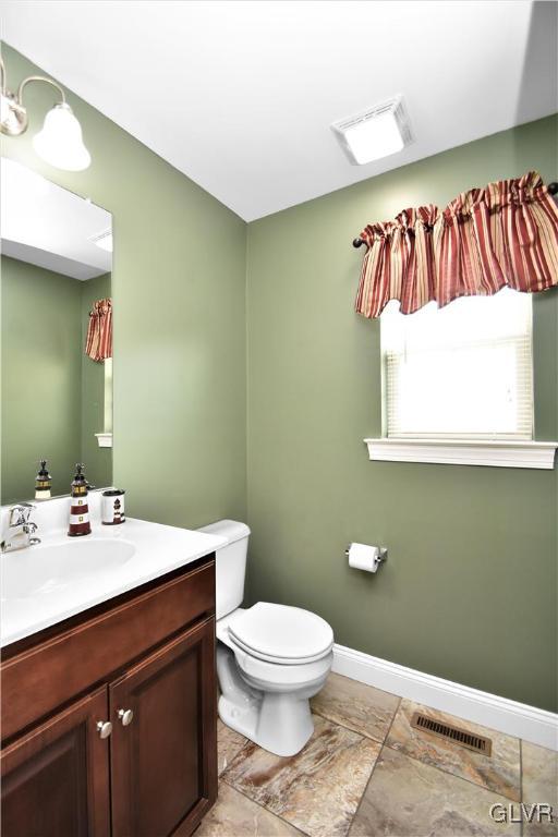 249 East Dell Road Bath, PA 18014 - Photo 26 of 50 a bathroom with a sink a toilet and a mirror