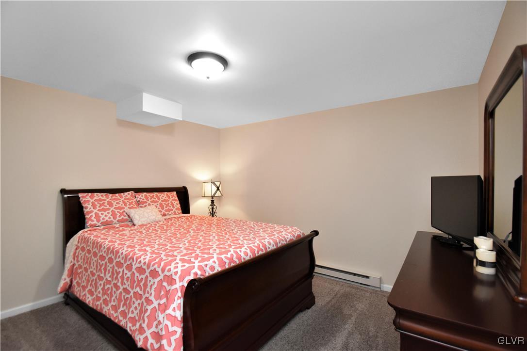 249 East Dell Road Bath, PA 18014 - Photo 28 of 50 a bedroom with a bed and a flat screen tv