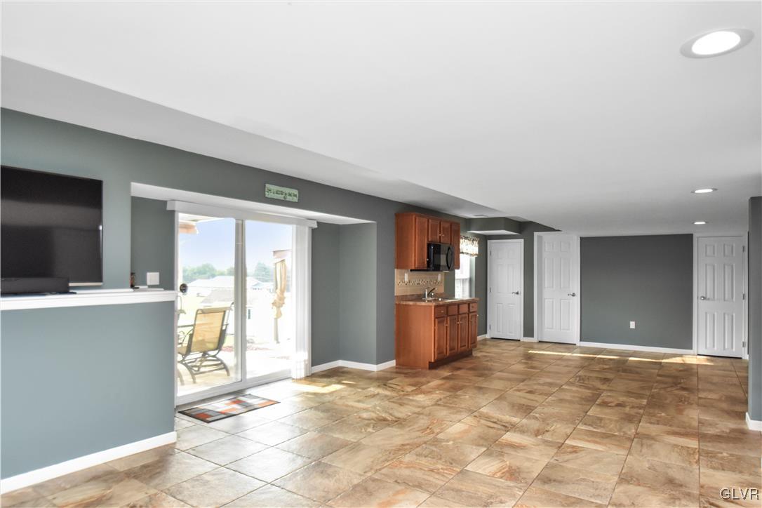 249 East Dell Road Bath, PA 18014 - Photo 33 of 50 a view of a big room with windows and chandelier