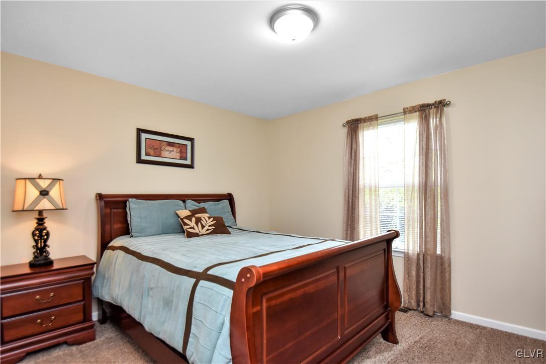 249 East Dell Road Bath, PA 18014 - Photo 36 of 50 a bed sitting in a bedroom next to a window