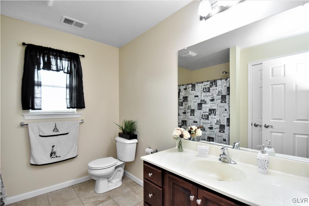 249 East Dell Road Bath, PA 18014 - Photo 39 of 50 a bathroom with a sink toilet and shower