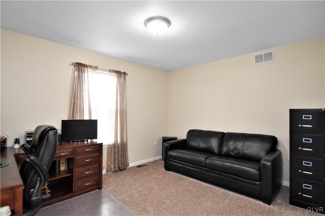 249 East Dell Road Bath, PA 18014 - Photo 40 of 50 a living room with furniture and a flat screen tv