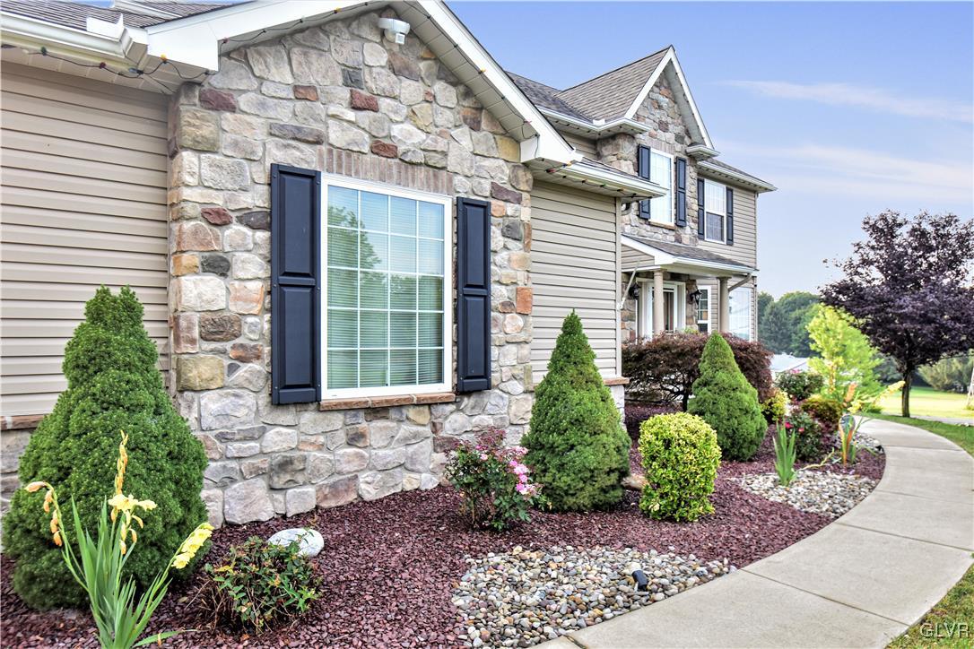 249 East Dell Road Bath, PA 18014 - Photo 4 of 50 a front view of a house with garden