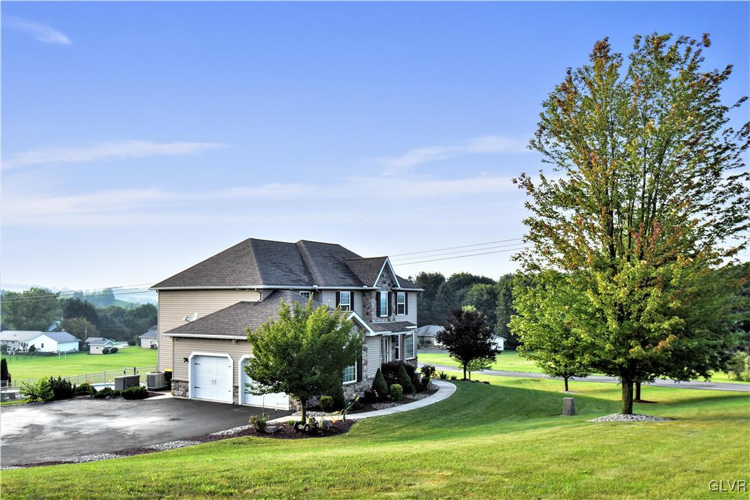 249 East Dell Road Bath, PA 18014 - Photo 6 of 50 a view of a house with a yard and sitting area