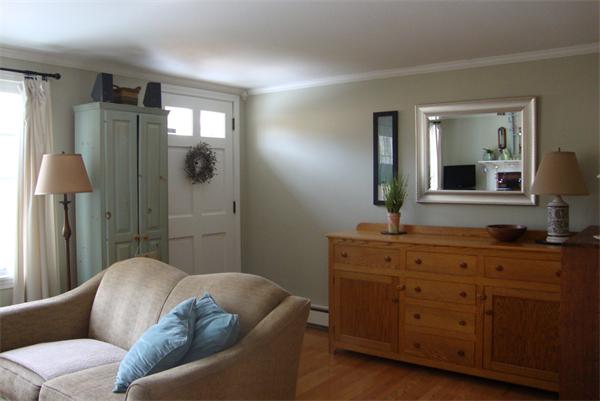 39 Carr Street Sutton, MA 01590 - Photo 4 of 24 a living room with furniture and mirror