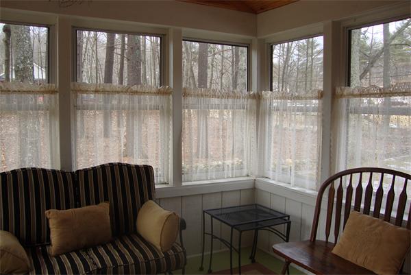 39 Carr Street Sutton, MA 01590 - Photo 9 of 24 a view of a chair and table in the balcony