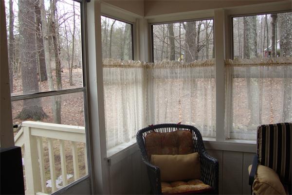 39 Carr Street Sutton, MA 01590 - Photo 10 of 24 a view of a balcony with furniture and windows