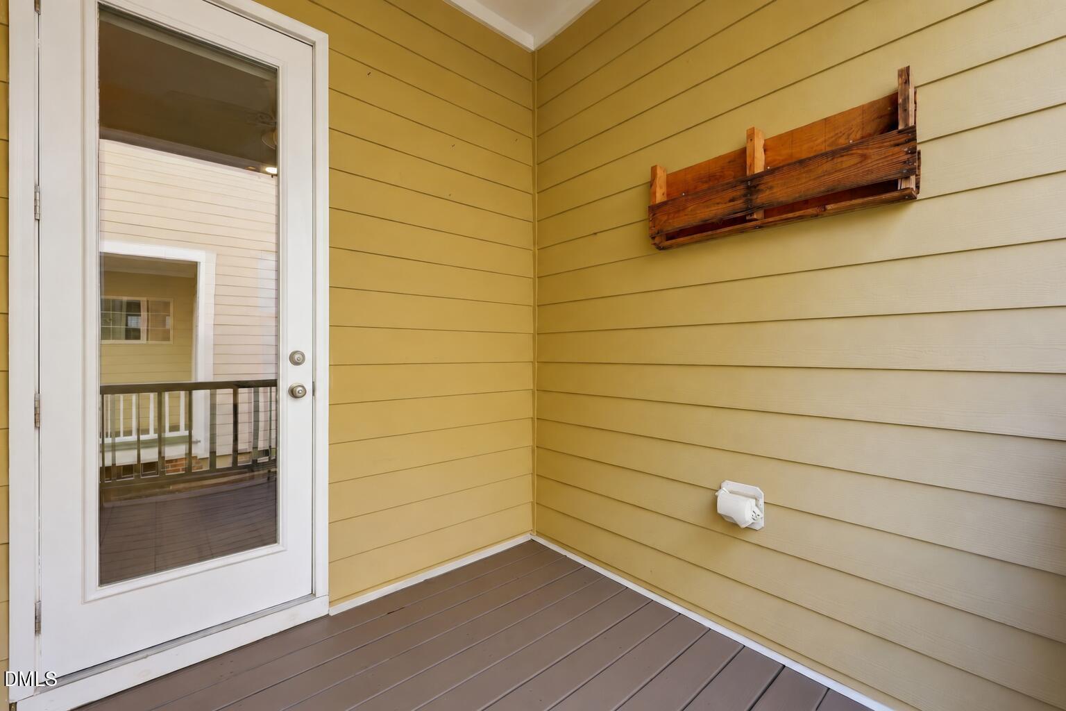 5329 Forsyth Park Street Raleigh, NC 27616 - Photo 8 of 28 Just off the kitchen, this inviting outdoor space offers endless possibilities—perfect for morning yoga, a peaceful cup of coffee, outdoor dining, or a private play area for children to enjoy.