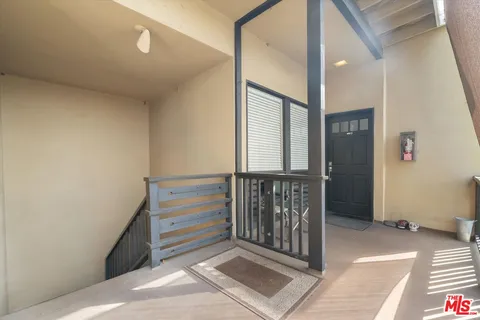 a view of a hallway with entryway