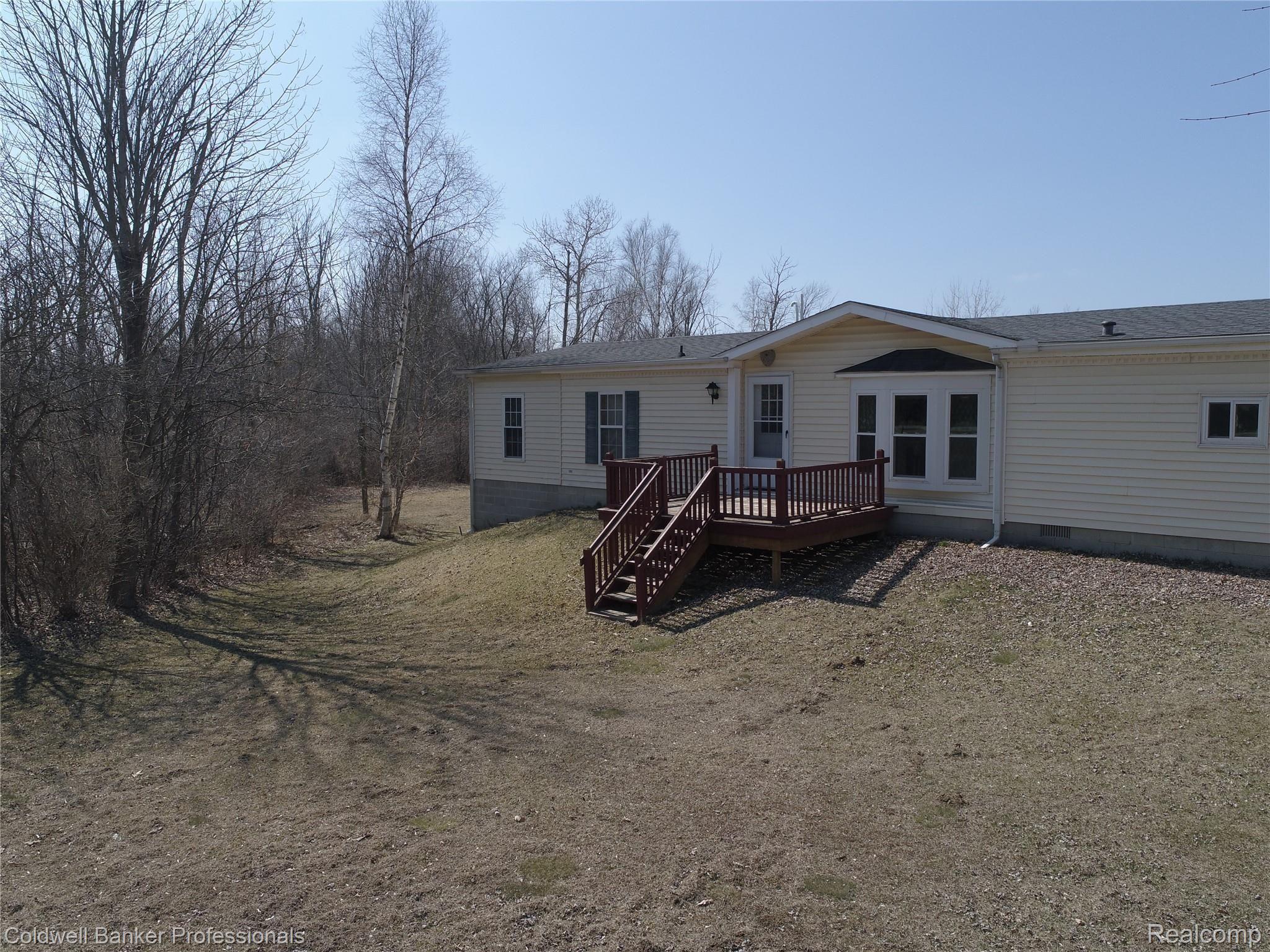 5485 Fish Lake Road North Branch, MI 48461 - Photo 7 of 30 Front to side yard.JPG