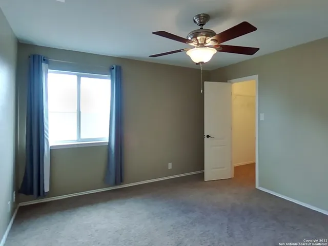 an empty room that has a window
