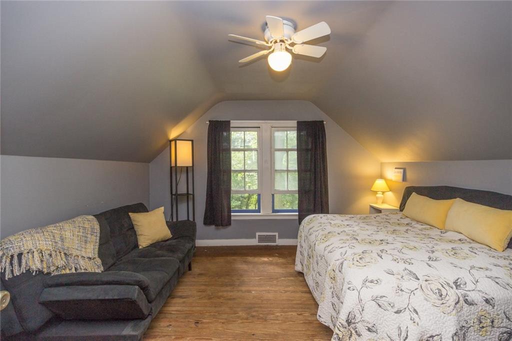 181 Oakville Road Beaver Falls, PA 15010 - Photo 14 of 20 Bedroom 4. Upper level. Refreshed paint, good ceiling height and a view overlooking the back yard/woods!