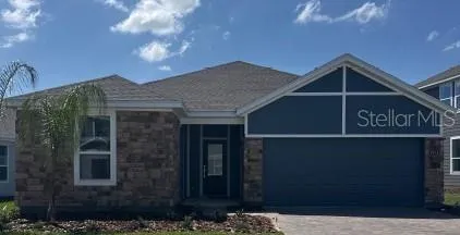 a view of a house with a street