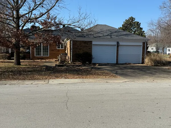 a view of a house with a garage