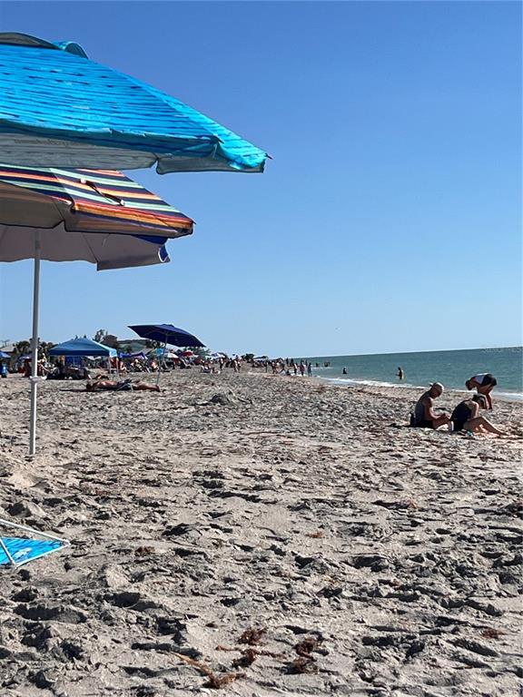2295 North Beach Road, Unit 23 Englewood, FL 34223 - Photo 2 of 20 a view of a backyard of a house