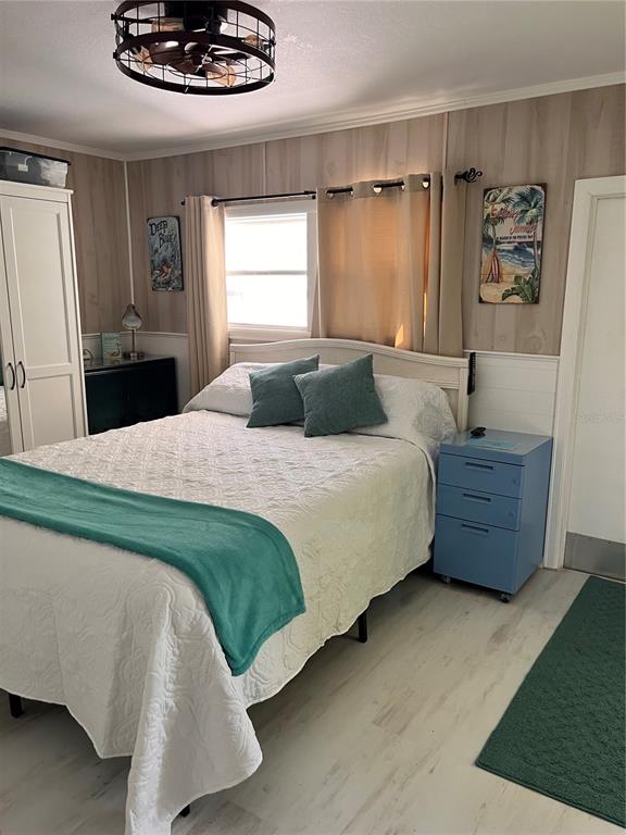 2295 North Beach Road, Unit 23 Englewood, FL 34223 - Photo 10 of 20 a bedroom with a bed and a window