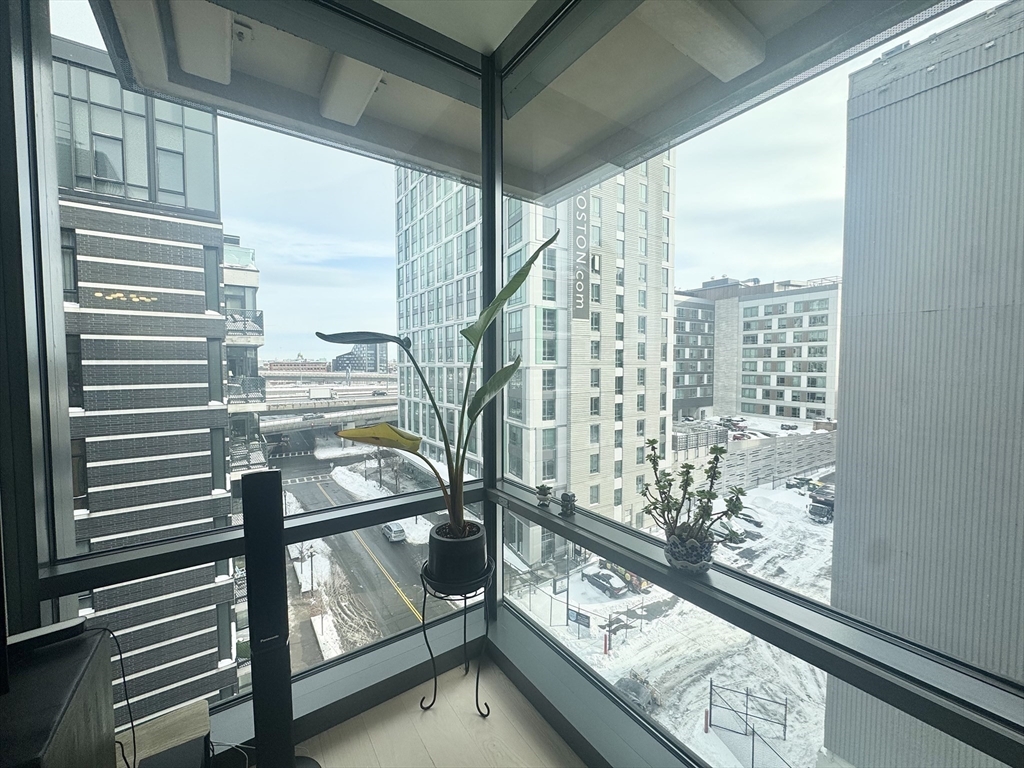 32 Traveler Street, Unit 609 Boston, MA 02118 - Photo 19 of 26 a view of a balcony with chairs