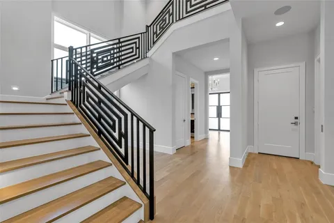 a view of entryway with wooden floor