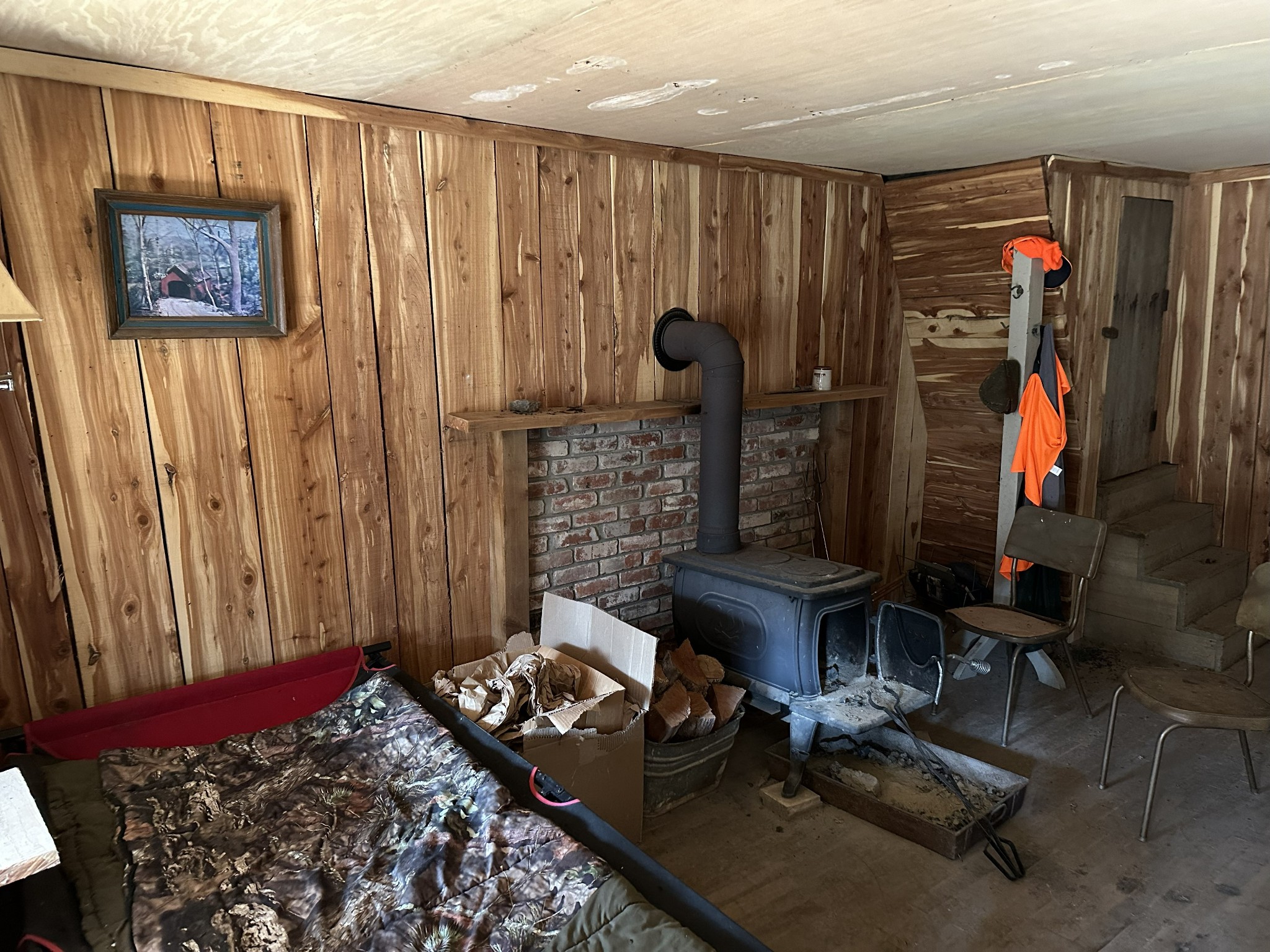 0 Factory Creek Road Waynesboro, TN 38485 - Photo 41 of 49 a bed room with a bed and a chair