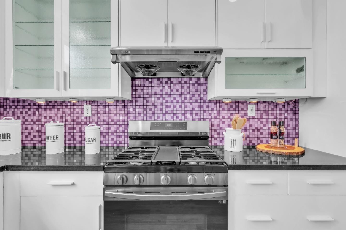 845 Fire Walk Milpitas, CA 95035 - Photo 14 of 40 a kitchen with stainless steel appliances granite countertop white cabinets and granite counter tops
