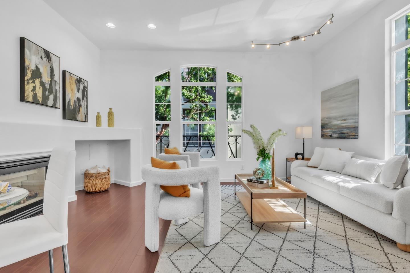 845 Fire Walk Milpitas, CA 95035 - Photo 2 of 40 a living room with fireplace furniture and a large window