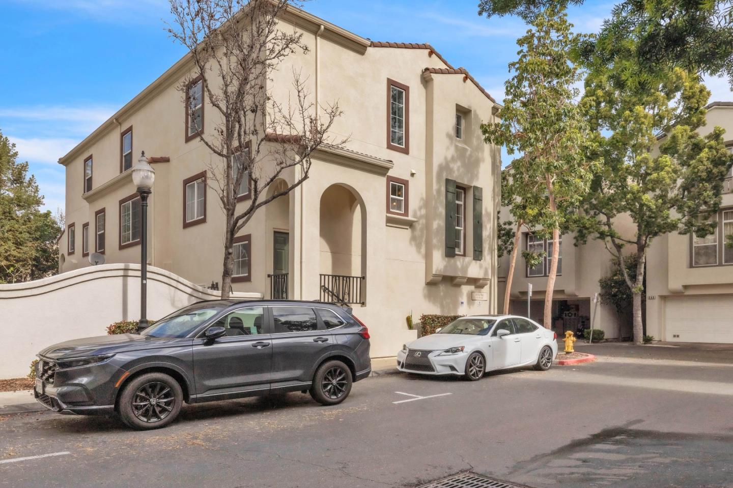 845 Fire Walk Milpitas, CA 95035 - Photo 26 of 40 a car parked in front of a white house