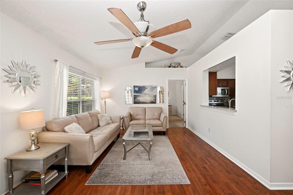 10618 Lake Ralph Drive Clermont, FL 34711 - Photo 7 of 26 a living room with furniture