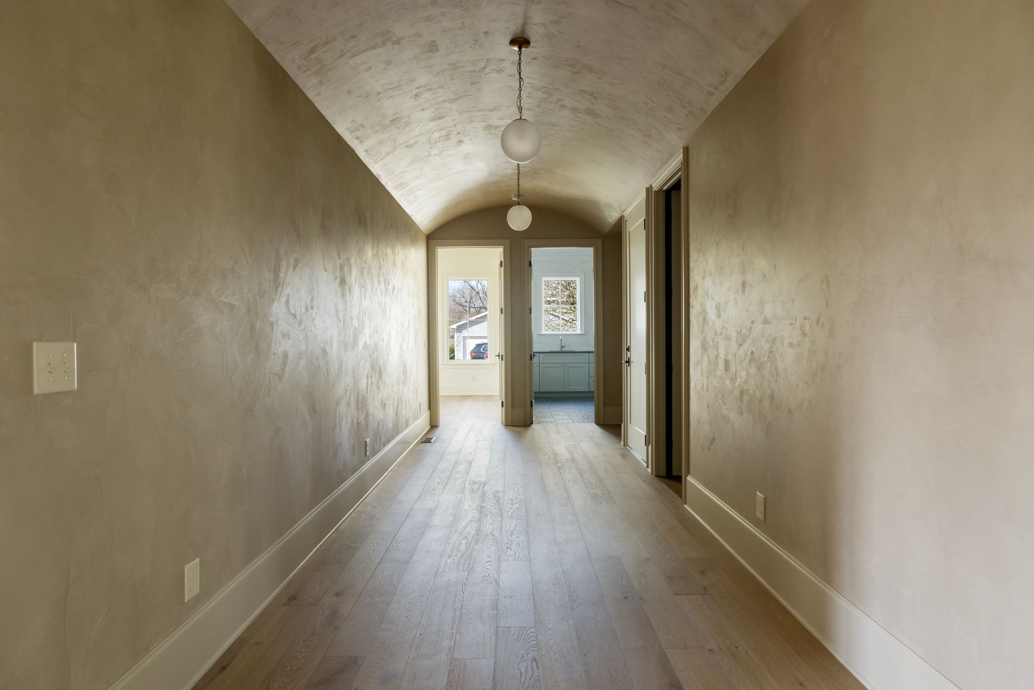 8238 Alamo Road Brentwood, TN 37027 - Photo 13 of 64 a view of a hallway with wooden floor and a window