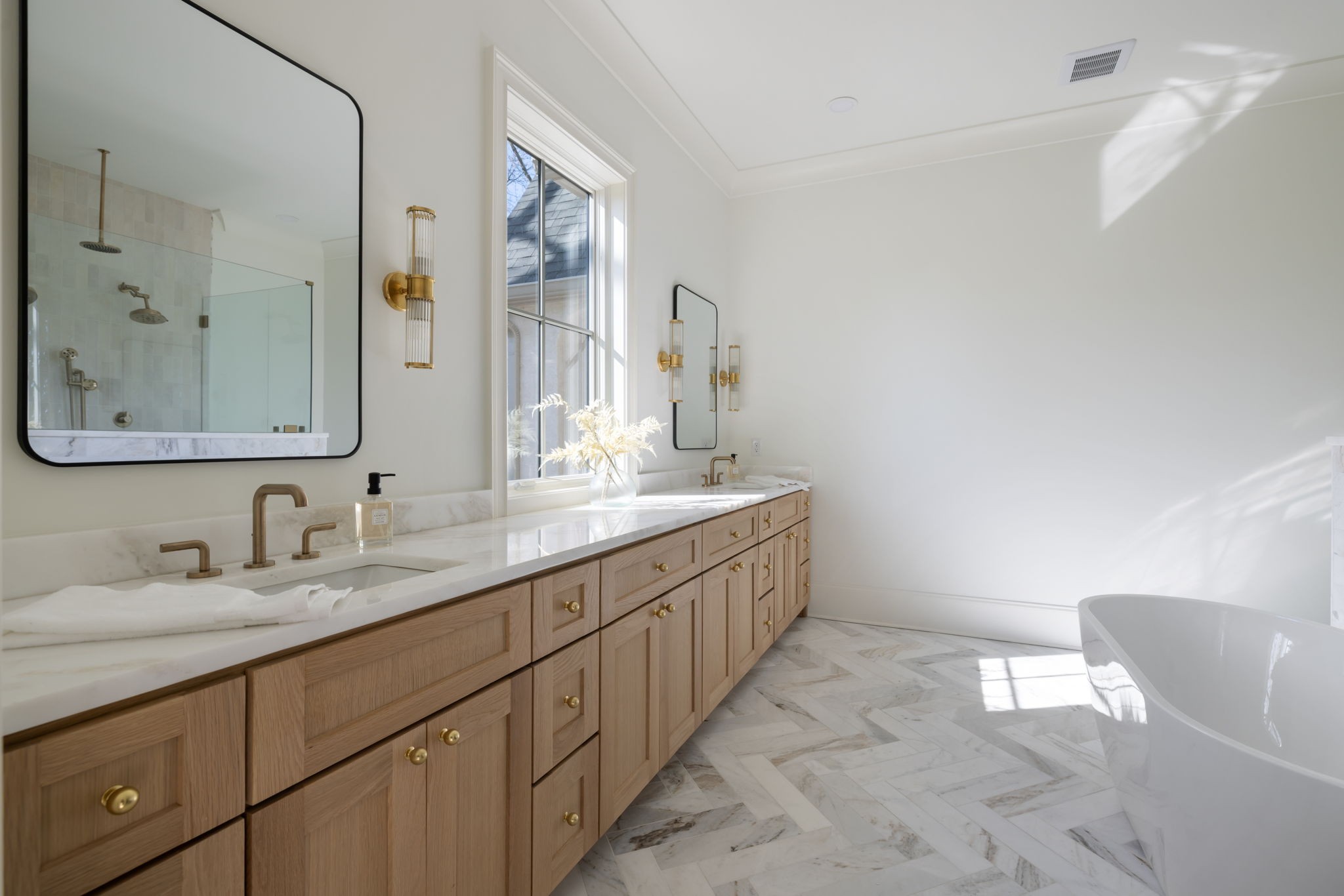 8238 Alamo Road Brentwood, TN 37027 - Photo 32 of 64 a bathroom with a double vanity sink and a mirror