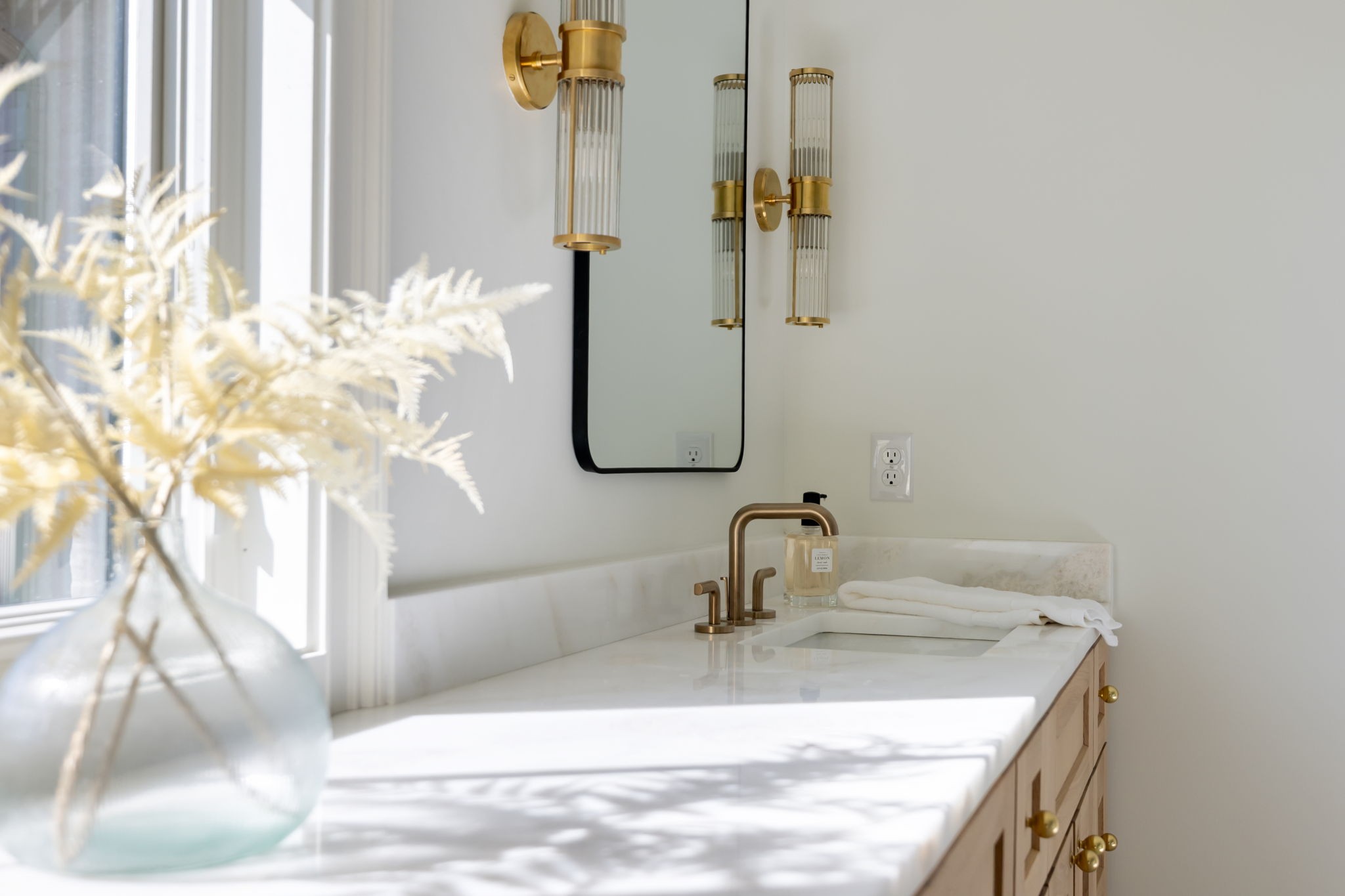 8238 Alamo Road Brentwood, TN 37027 - Photo 35 of 64 a bathroom with a sink and a mirror