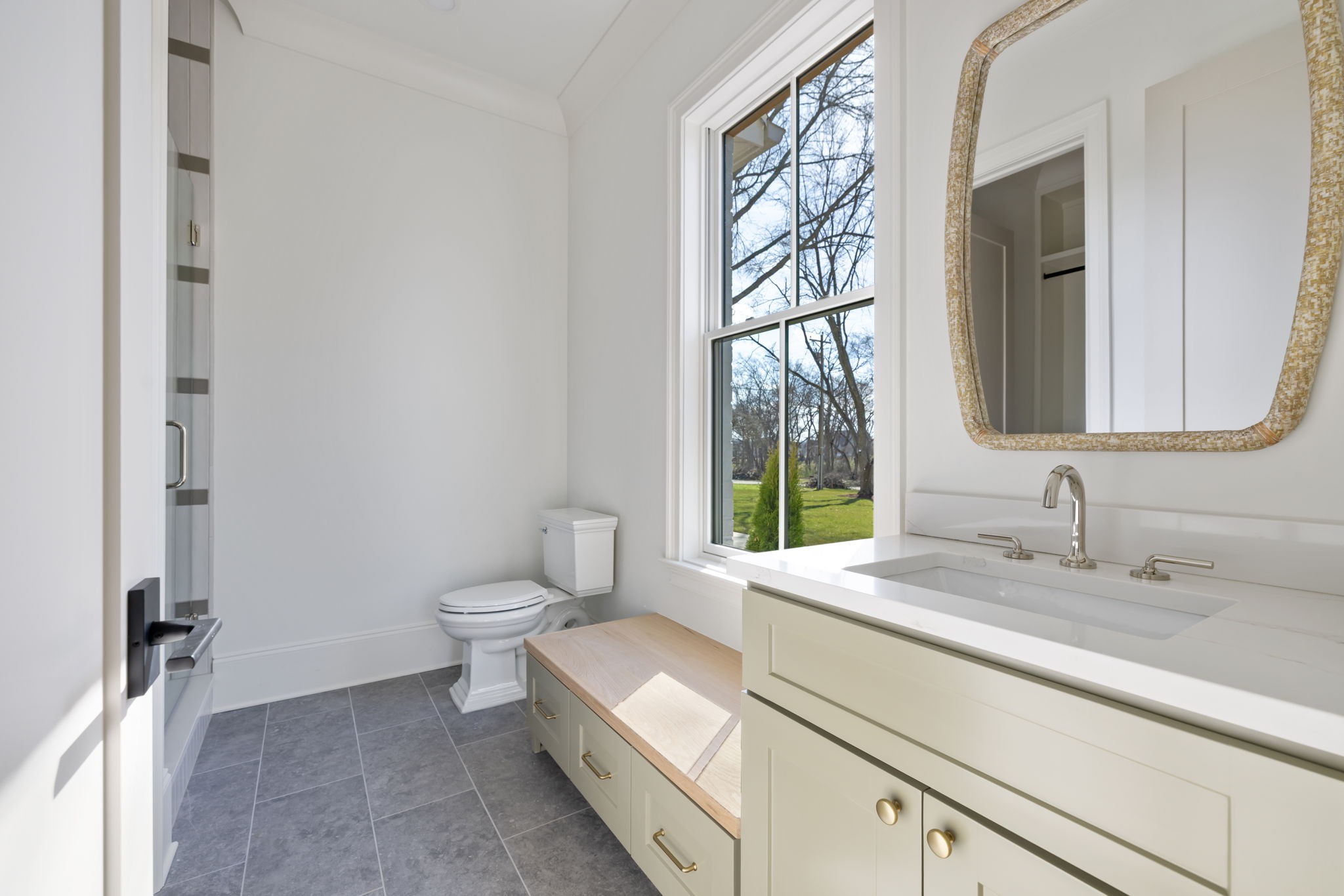 8238 Alamo Road Brentwood, TN 37027 - Photo 44 of 64 a bathroom with a granite countertop sink mirror vanity and toilet