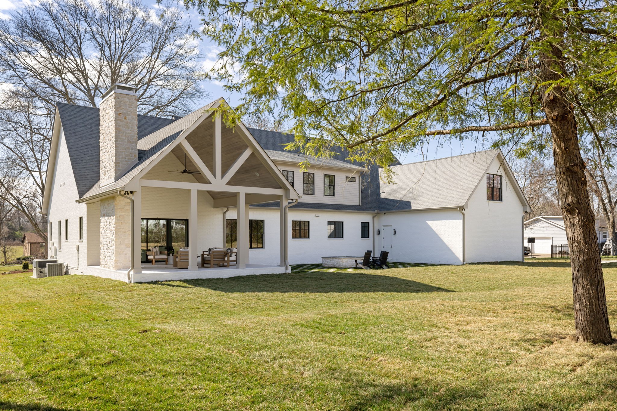 8238 Alamo Road Brentwood, TN 37027 - Photo 62 of 64 a front view of house with yard and trees around