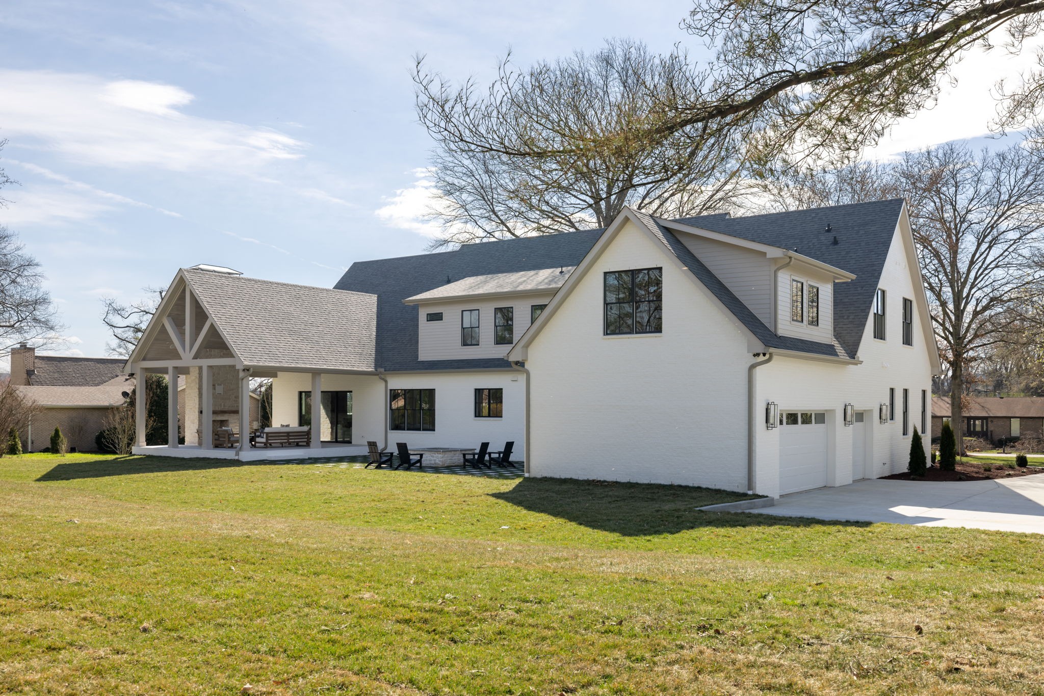 8238 Alamo Road Brentwood, TN 37027 - Photo 63 of 64 a front view of a house with swimming pool and porch