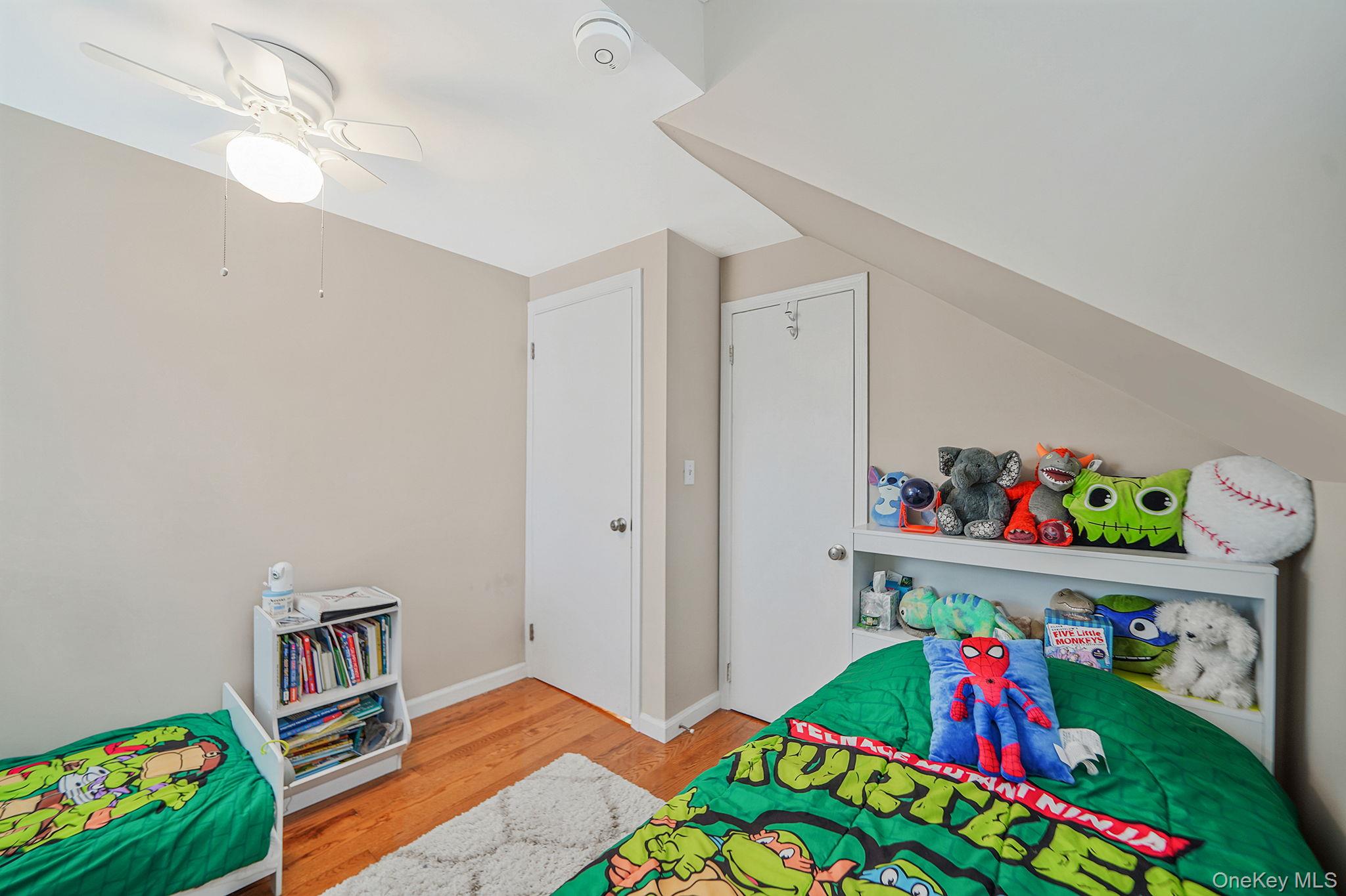 4 Willow Road Rocky Point, NY 11778 - Photo 21 of 30 Game room with wood finished floors and a ceiling fan