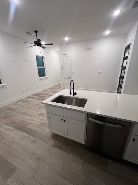 8508 Wileyvale Road, Unit B Houston, TX 77016 - Photo 5 of 16 a kitchen with a sink and a refrigerator