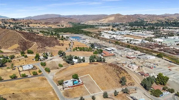 an aerial view of residential house with parking space