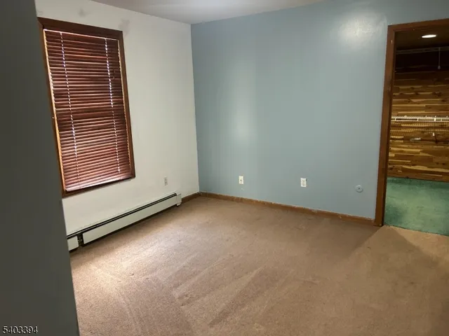 a view of a room with a window