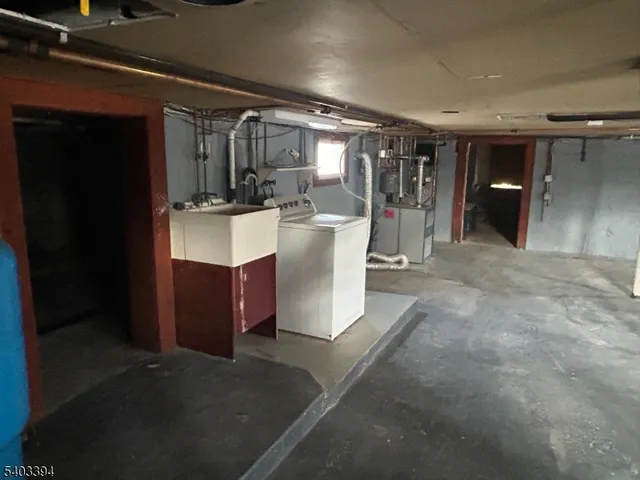 a view of a bathroom with a tub and sink
