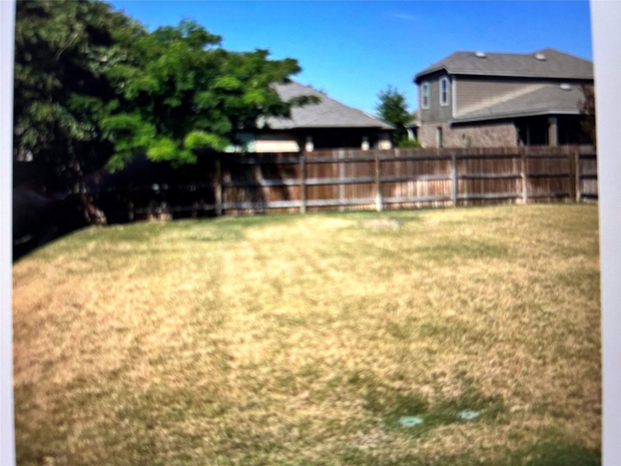 211 Animas Drive Georgetown, TX 78626 - Photo 22 of 25 a view of a house with a yard and sitting area