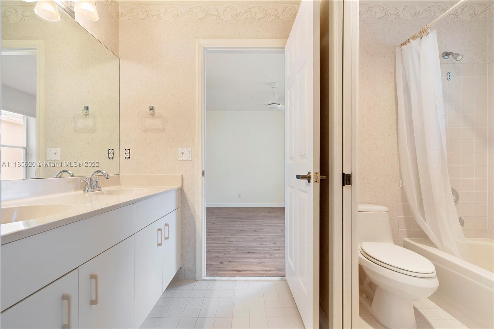 2660 Palmer Place Weston, FL 33332 - Photo 14 of 22 a bathroom with a sink a toilet and shower