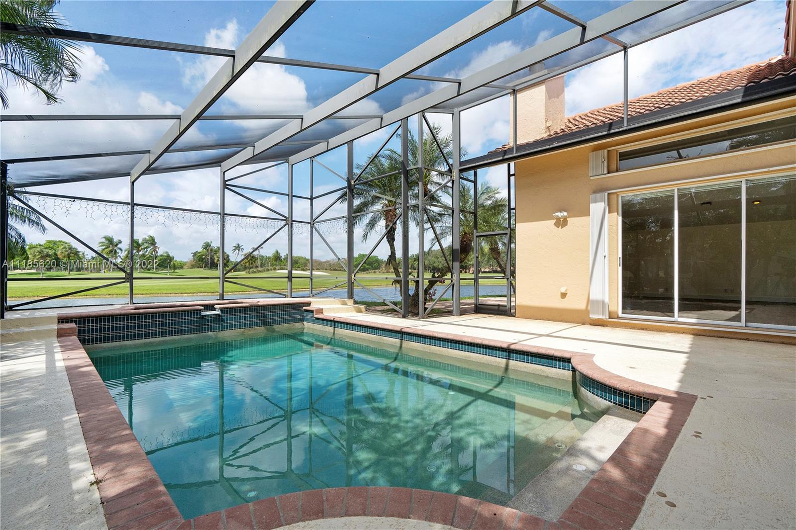 2660 Palmer Place Weston, FL 33332 - Photo 16 of 22 a house view with swimming pool and sitting area